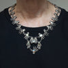 givinng hands sterling silver necklace with moonstones and labradorite is show being worn
