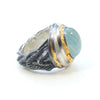 organic chrysler building ring, blackened sterling silver, 24k golf foil fused to the silver, oval aquamarine cab. side
