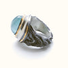 organic chrysler building ring, blackened sterling silver, 24k golf foil fused to the silver, oval aquamarine cab. Side.