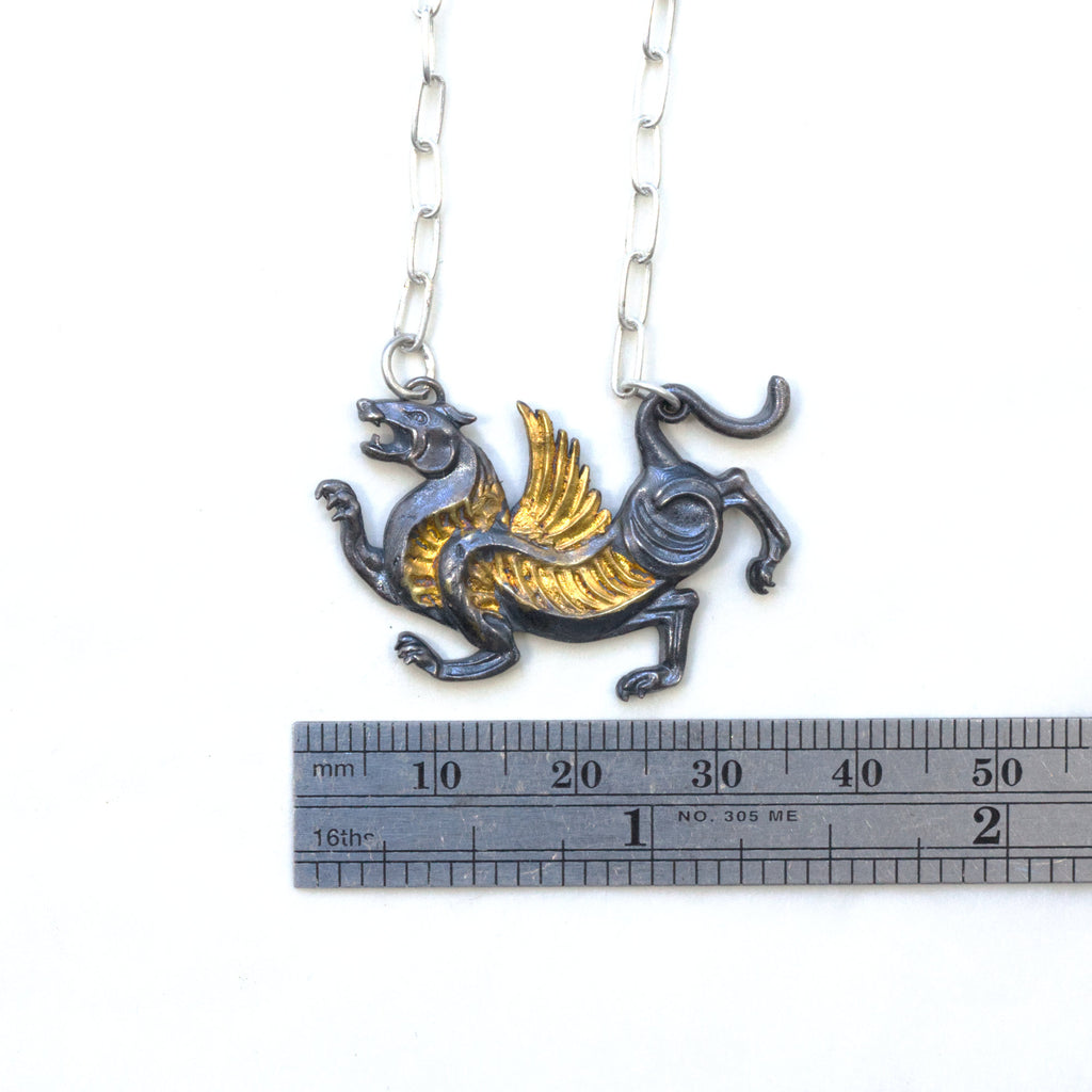 blackened silver and gold tiger with wings necklace. measure