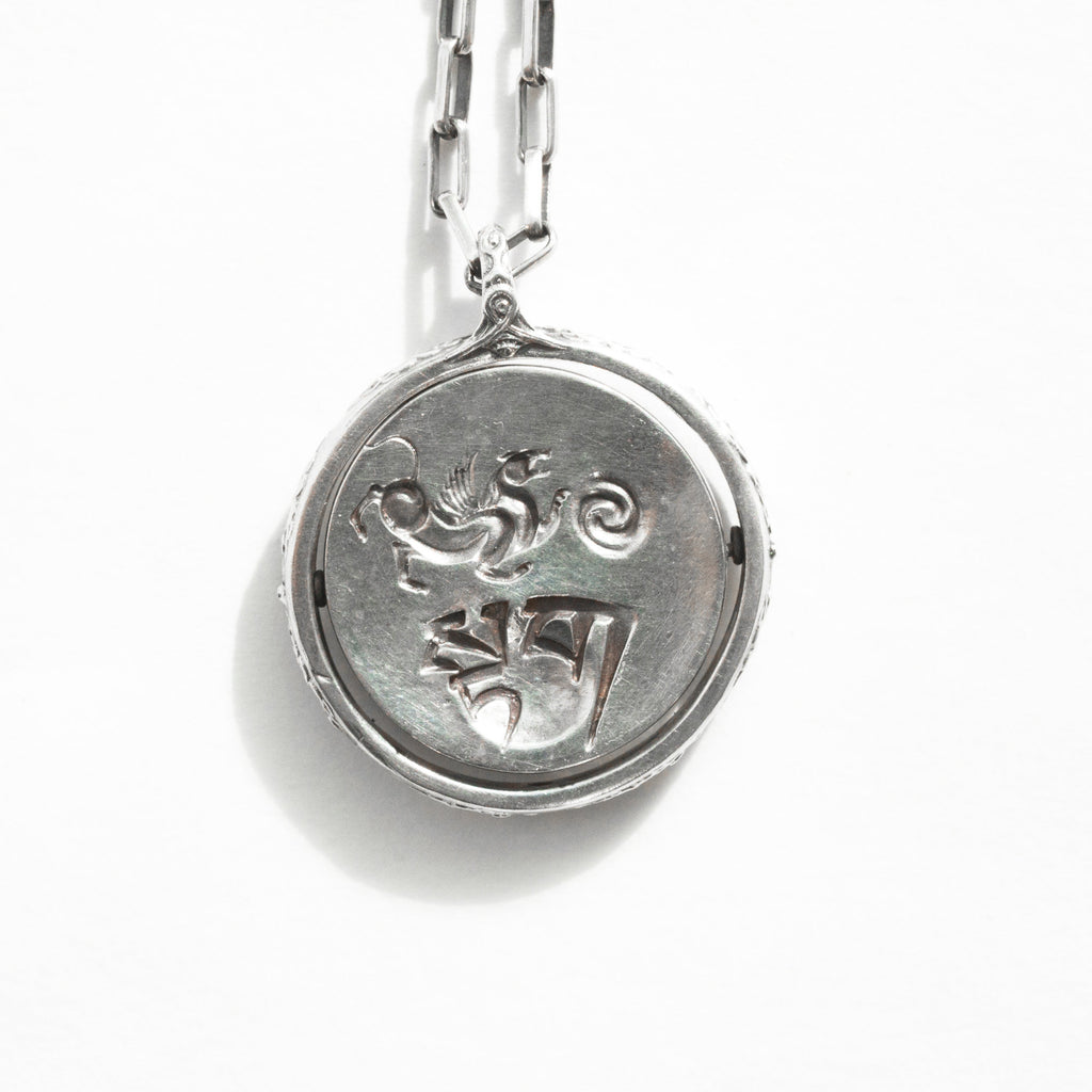 AIr Tiger double sided silver pendant. It flips. back.