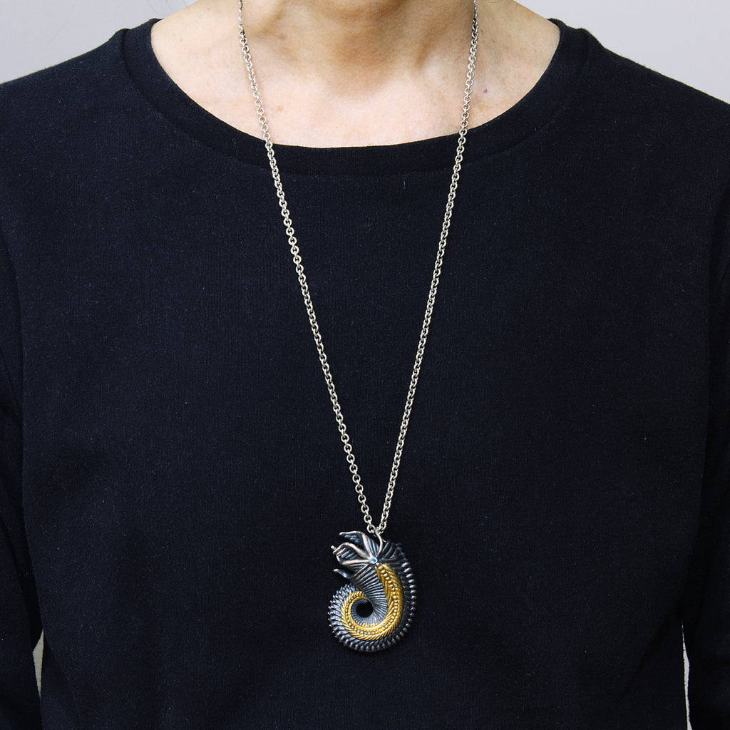 Alien Shrimp Brooch Pendant. Sterling silver, gold foil fused to the silver, apatite. as worn