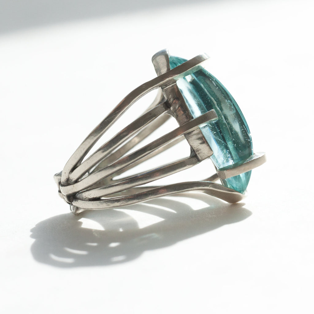 five band aquamarine silver ring size 7 side view in a different kind of light
