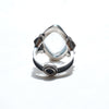 size 9 ring, light colored aquamarine you can see through, sterling silver, liver of sulfur patina. Back.