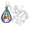 aquamarine teardrop, sterling silver necklace with green, yellow and red cabs underneath. With chain and clasp