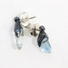 mismatched aquamarine and blackened silver mounts earrings. side view