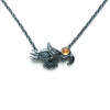 soaring bird blackened silver with garnet eye