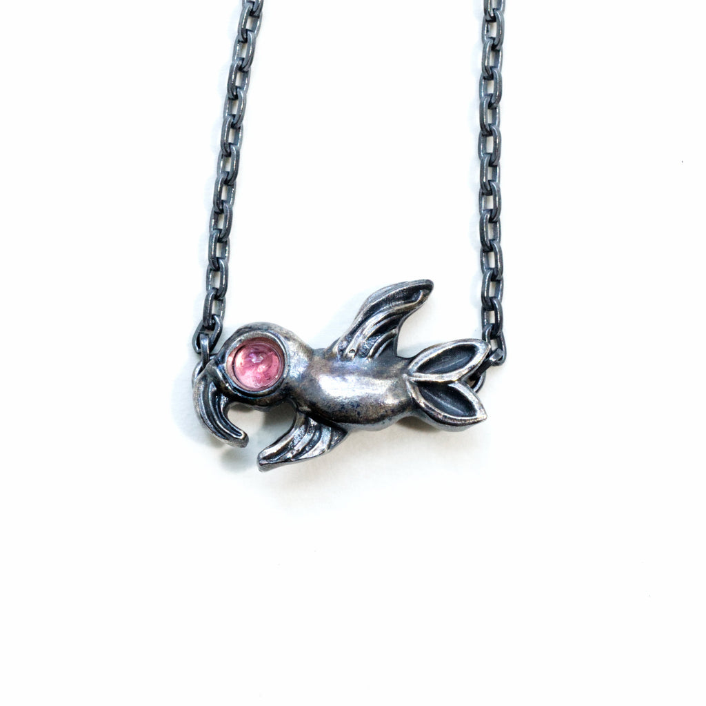 flying bird blackened silver with pink tourmaline eye necklace