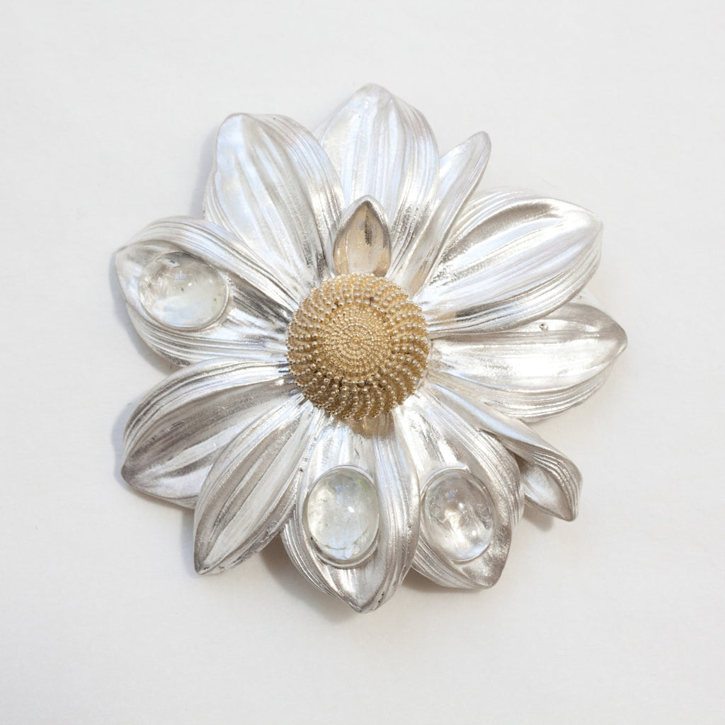 Spring time dahlia, silver with a 10 gold disc floret, topaz dewdrops brooch. Front