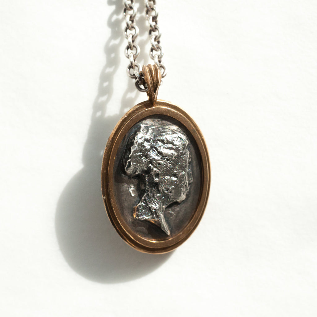 Grecian inspired double-sided cameo pendant with aged stone version on the back, silver and bronze-bac