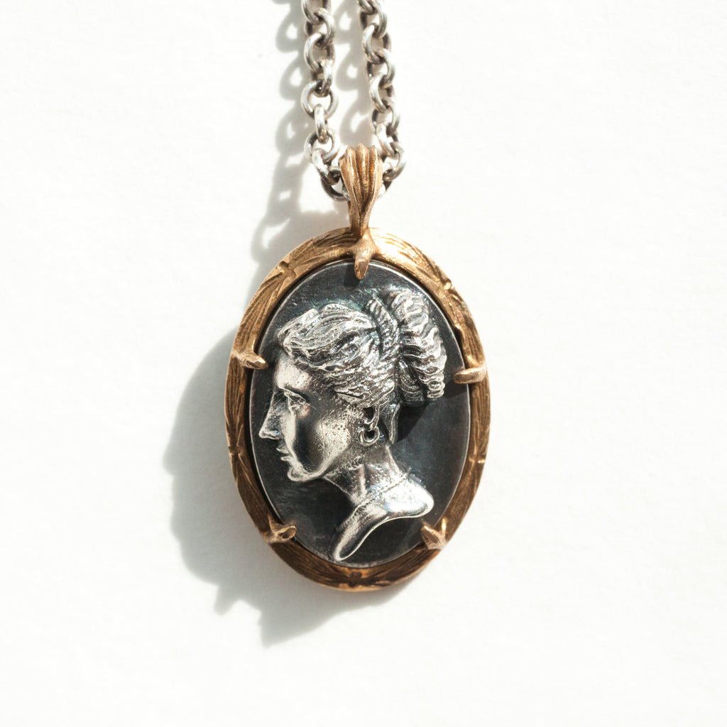 Grecian inspired double-sided cameo pendant with aged stone version on the back, silver and bronze-front