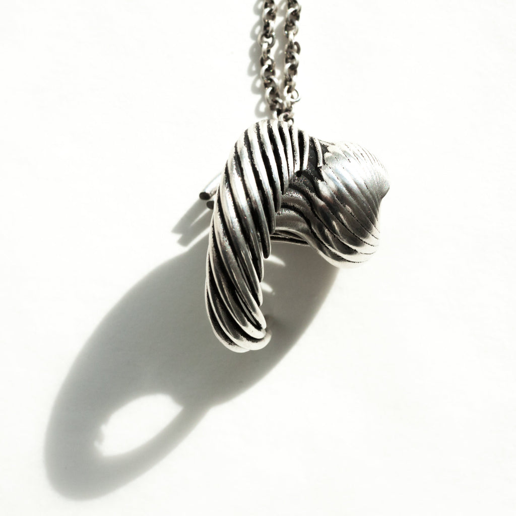 double spiral s-curve silver pendant- one of many angles