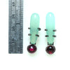 chrysoprase and rhodolite garnet in an exclamation point arrangement. with shoelace setting. measure.