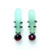 chrysoprase and rhodolite garnet in an exclamation point arrangement. With shoelace setting. front