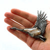 flying swan baroque pearl sterling silver brooch, in hand to show size.