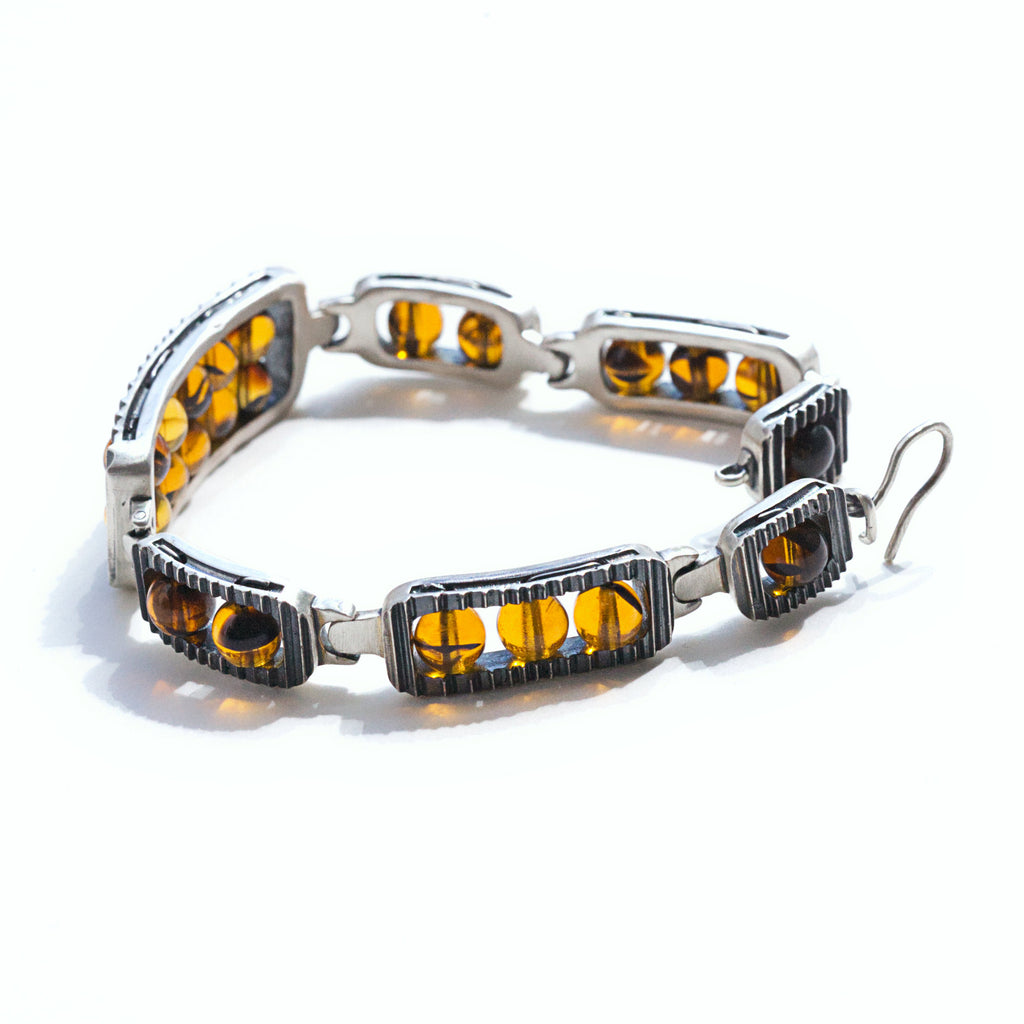 harjo amber bead bracelet side view with hook clasp