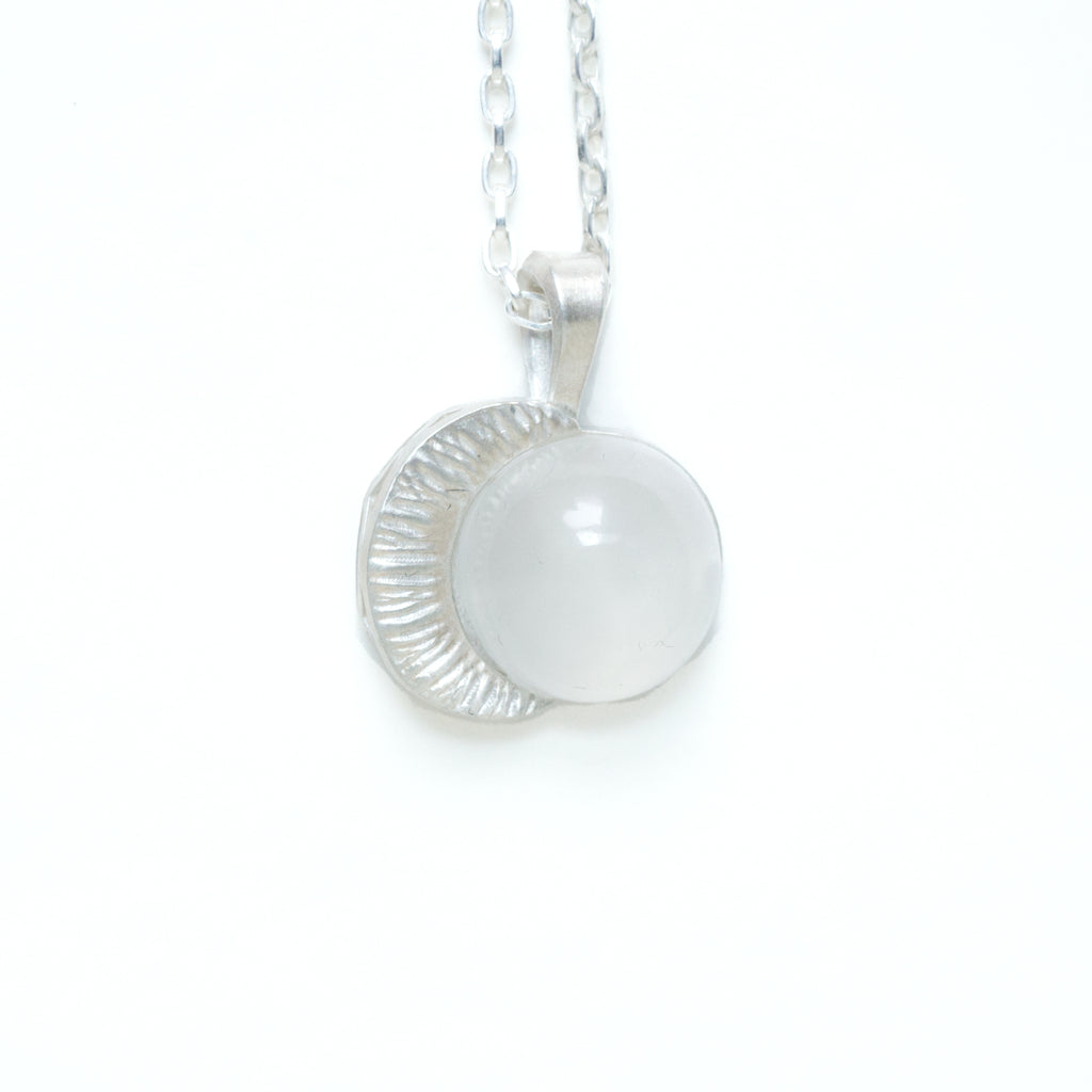 moonstone moon sterling silver pendant with 16" chain. Front