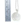 moonstone moon sterling silver pendant with 16" chain. measure