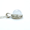 moonstone moon sterling silver pendant with 16" chain. side