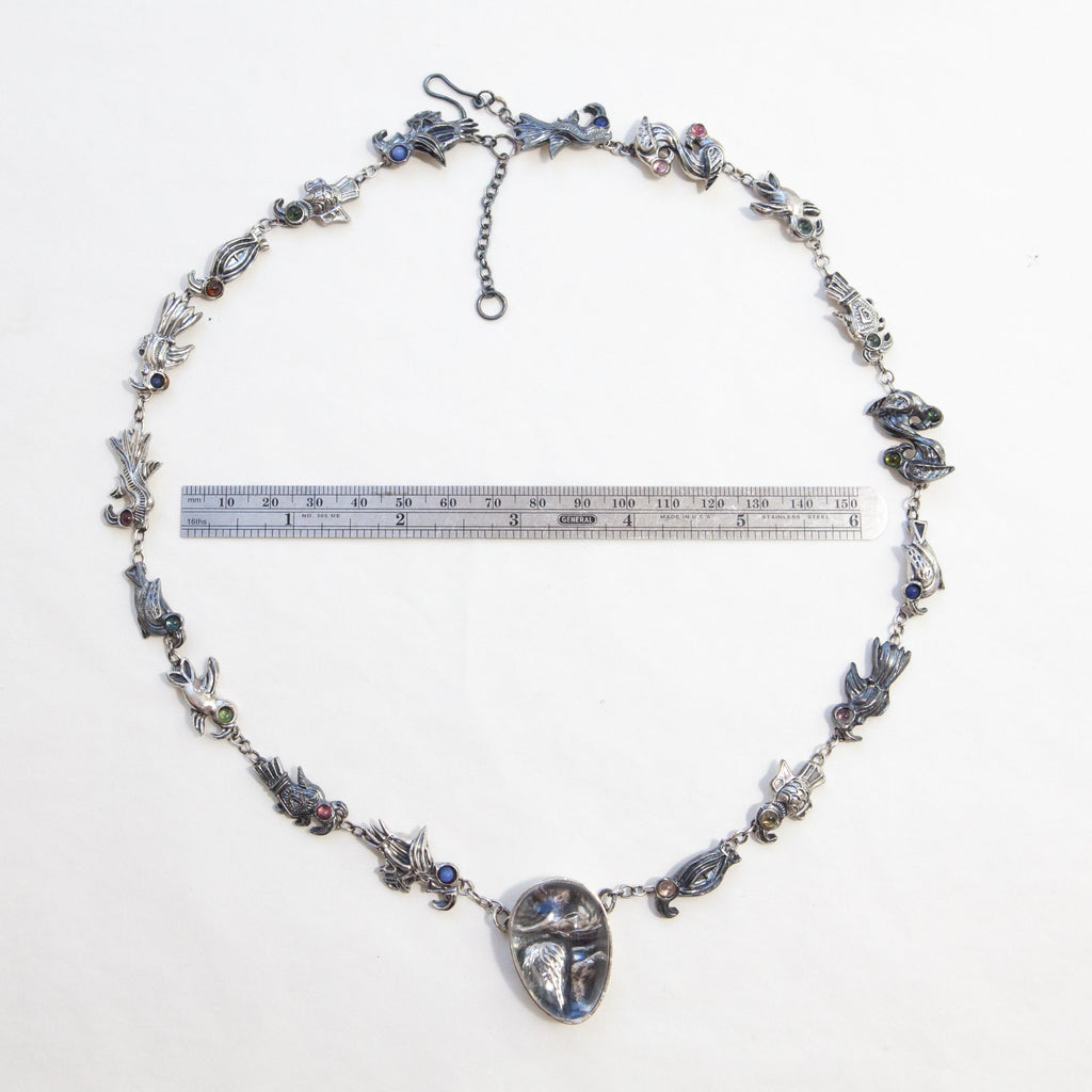 with gemstone eyes-view of entire necklace with ruler