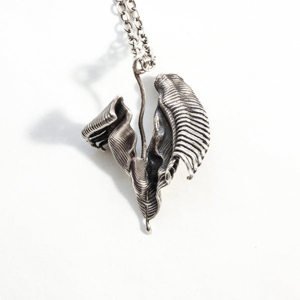 silver splash, a spiral of water, frozen moment in time  Silver pendant-front