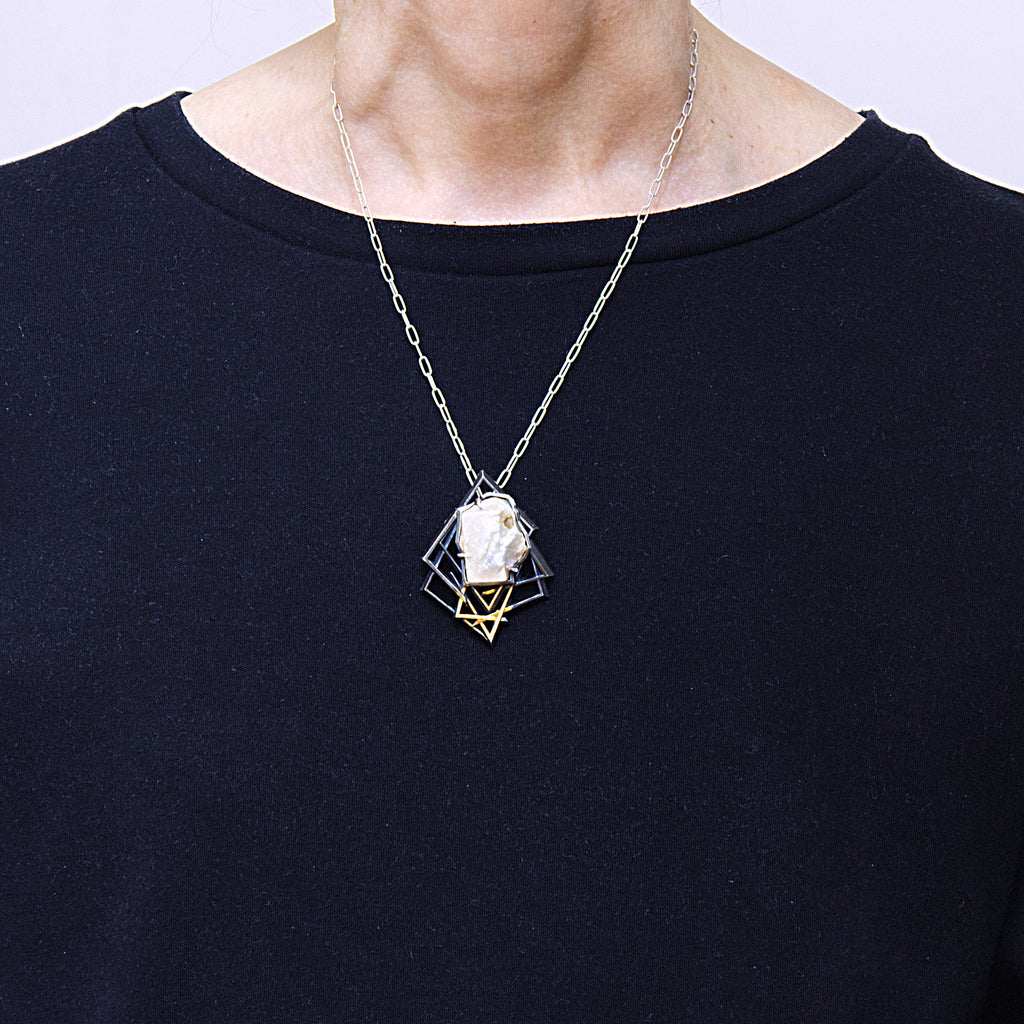 Square Face Baroque brooch pendant, sterling silver, 24k gold foil infused with keum boo process, As worn.