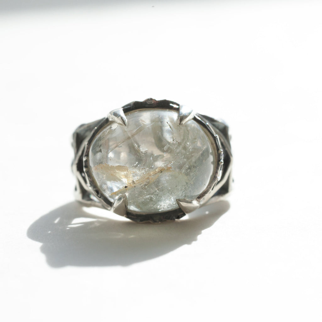 topaz Ah silver ring size 7 close up of inclusions in the gem stone