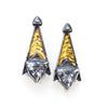 Grey spinel tri post back earrings. BLackened siver 24k gold foil fused to the silver. triangular grey spinels.Front