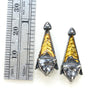 Grey spinel tri post back earrings. Blackened siver 24k gold foil fused to the silver. triangular grey spinels.Measure