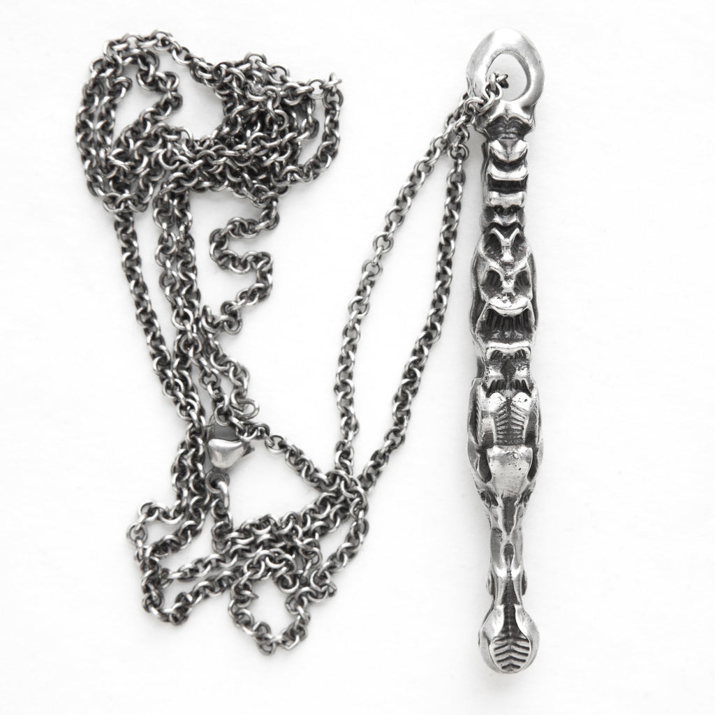  abstracted from a swimming alligator silver pendant-side