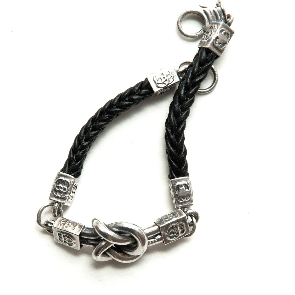 Double love knot or friendship knot silver and leather bracelet-top
