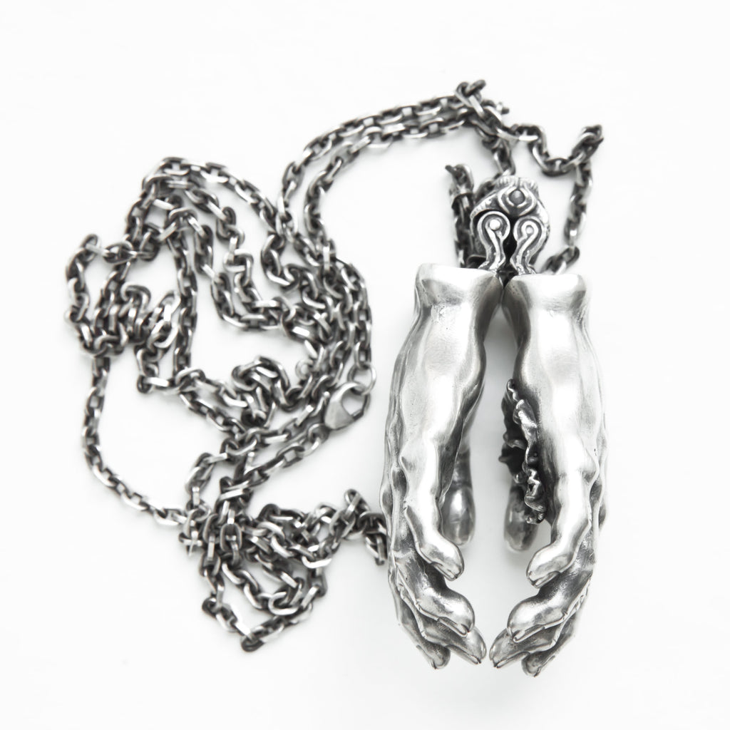 Hands with hidden flower silver pendant-back