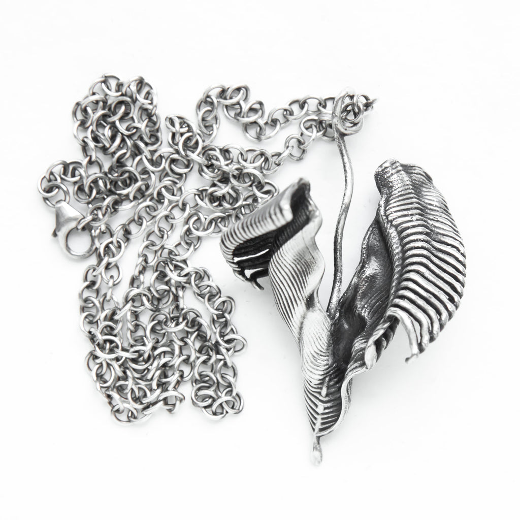  silver splash, a spiral of water, frozen moment in time  Silver pendant-back