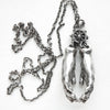 Silver hands pendant opens to reveal hidden eyes-back