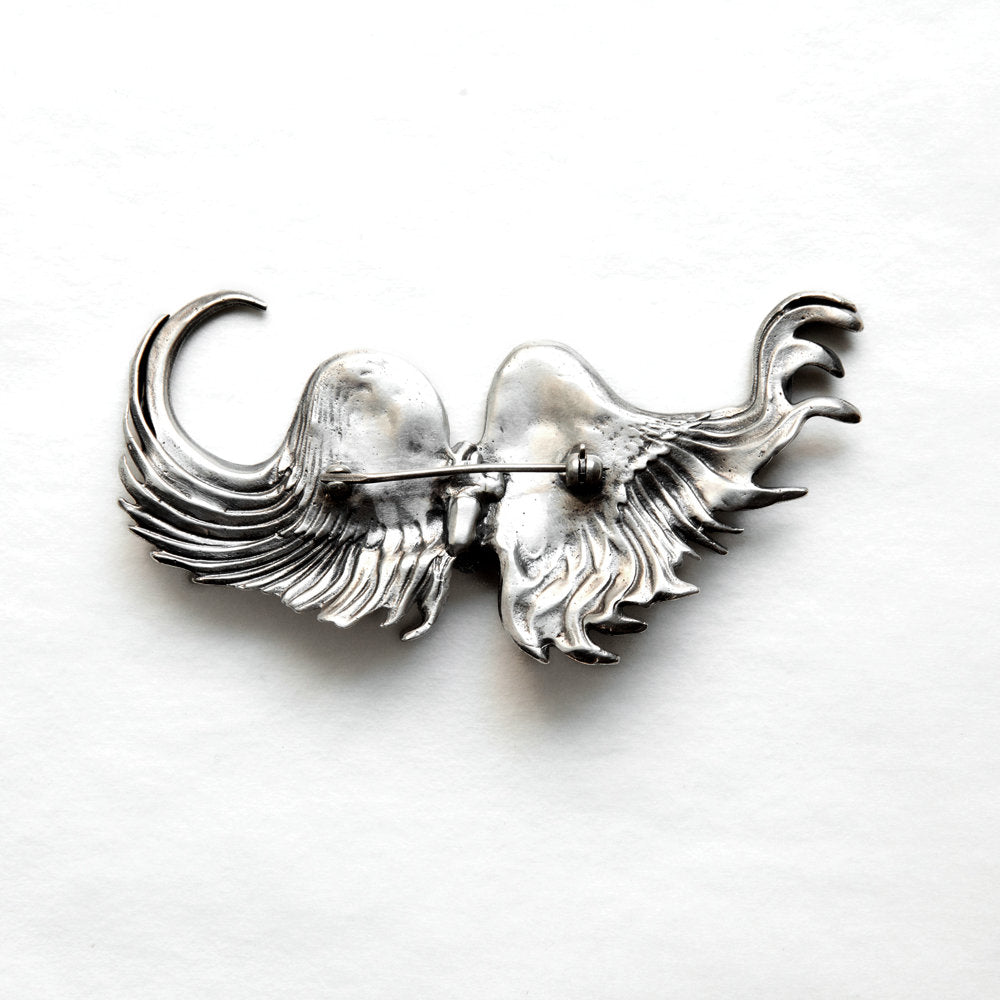 Stylized wings brooch with realistic heart, sterling silver, back